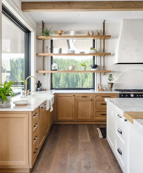 Remodeled kitchen with white and wood cabinets.